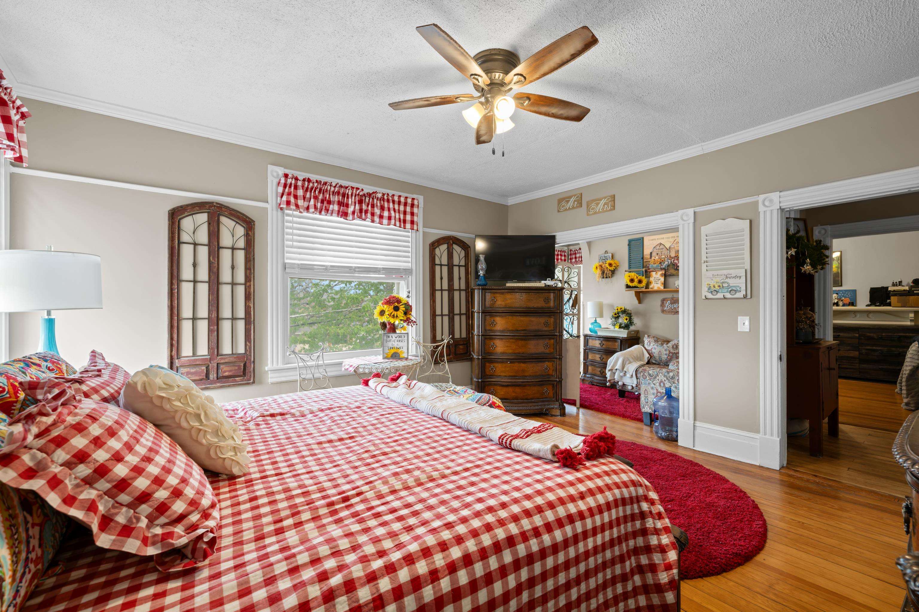 1224 4th Street Waynesboro, VA 22980 - Photo 38 of 75 a bed sitting in a bedroom next to a window