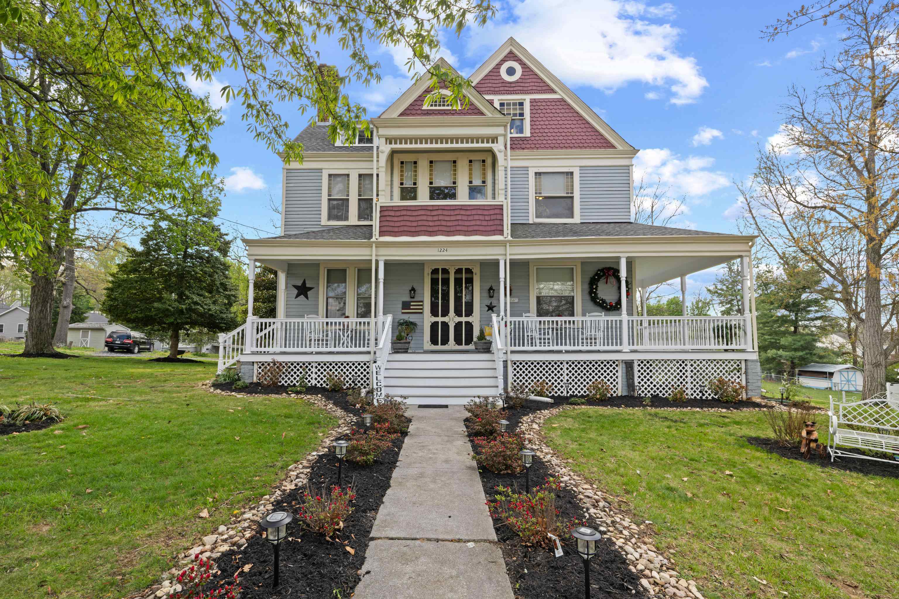 1224 4th Street Waynesboro, VA 22980 - Photo 4 of 75 a front view of a house with a yard
