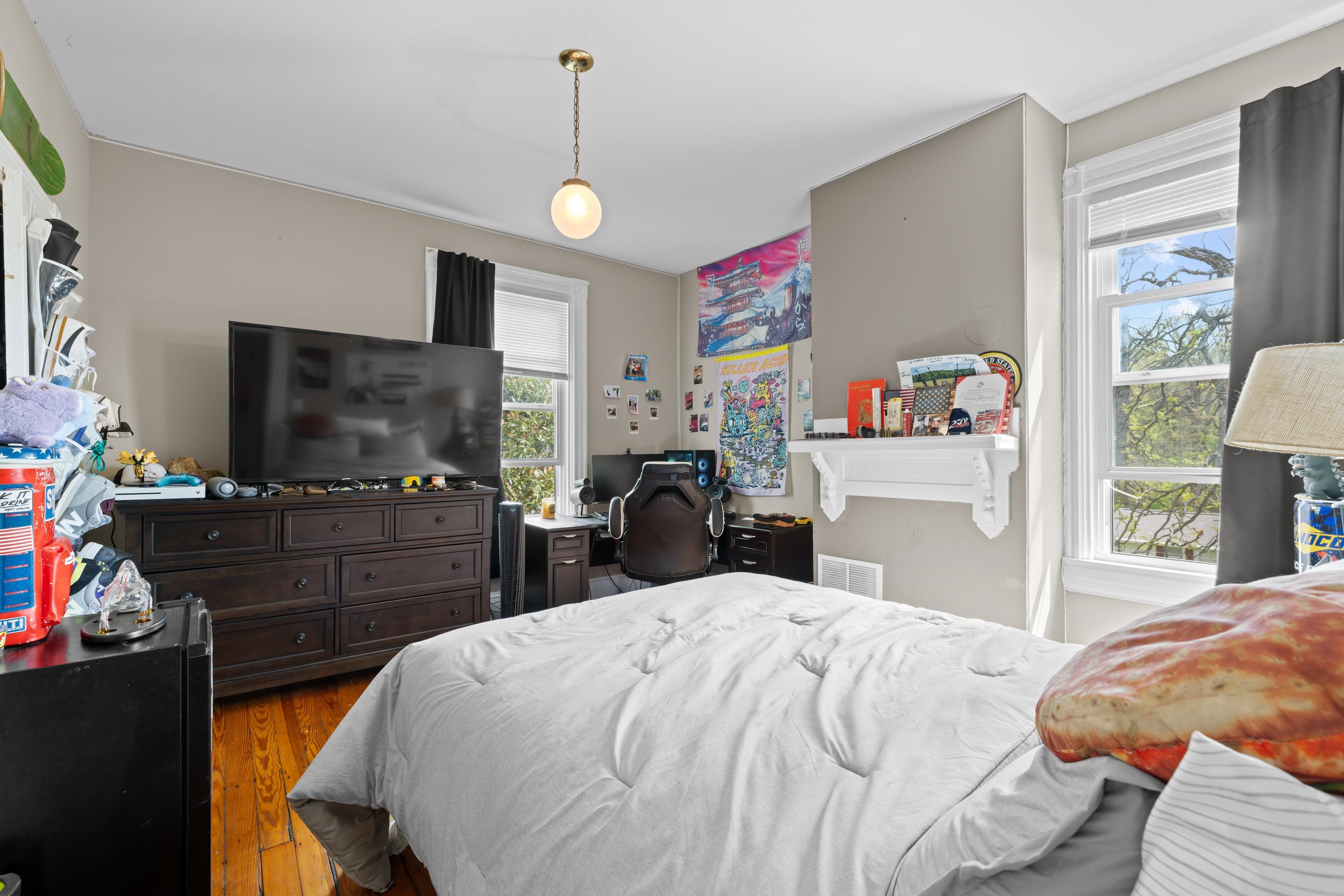 1224 4th Street Waynesboro, VA 22980 - Photo 47 of 75 a bedroom with a bed and a flat screen tv