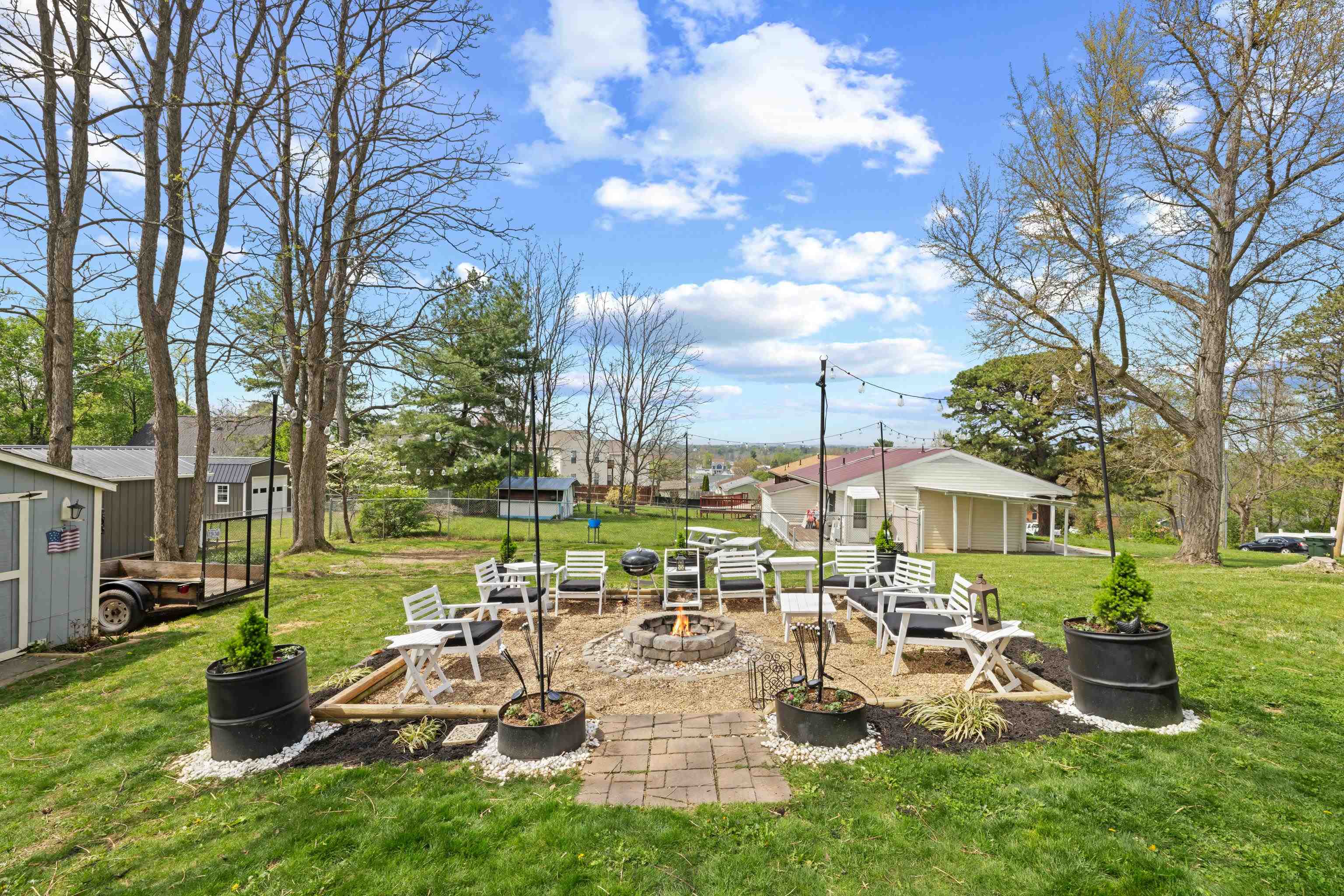 1224 4th Street Waynesboro, VA 22980 - Photo 58 of 75 a view of a chair and tables in the garden