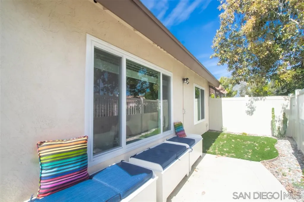 8803 Capcano Road San Diego, CA 92126 - Photo 13 of 24 a front view of a house with balcony