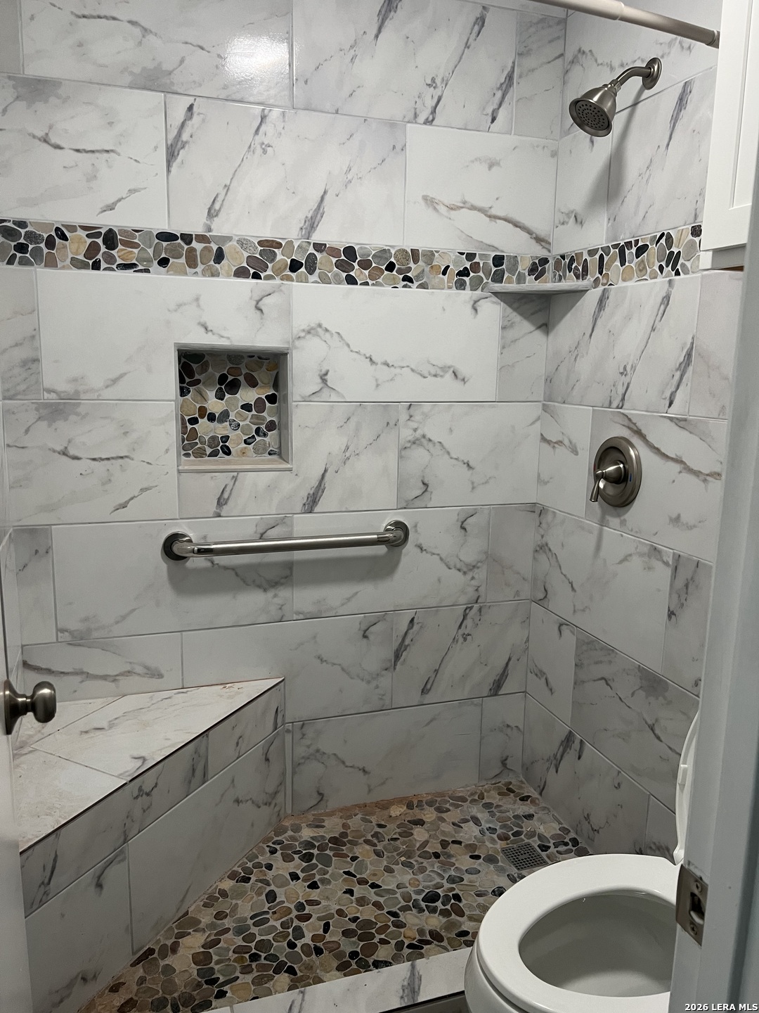 108-110 Whisper Way Boerne, TX 78006 - Photo 8 of 15 a bathroom with a sink toilet and shower