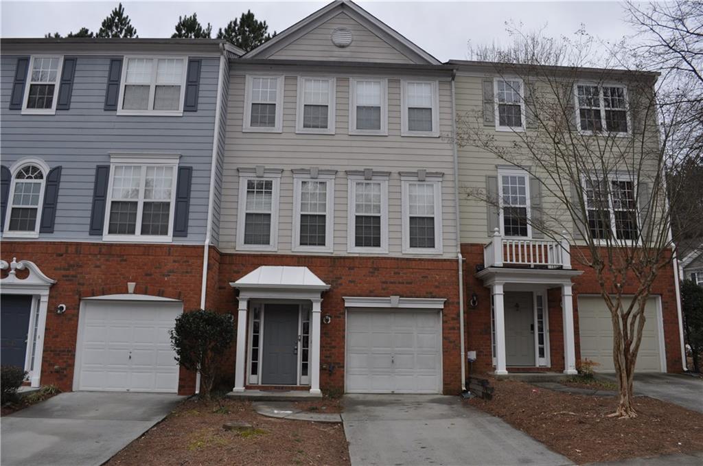 4014 Howell Park Road Duluth, GA 30096 - Photo 1 of 1 a front view of a house with glass windows