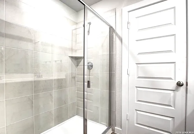 a view of a room with racks on the wall