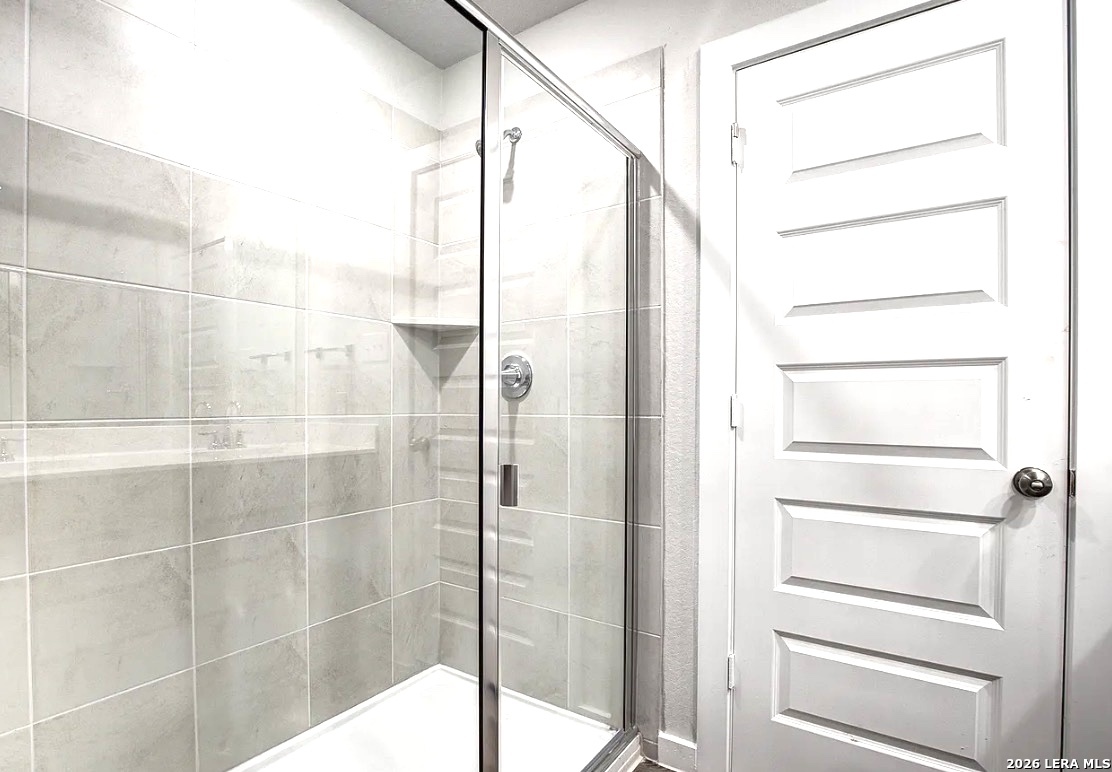 2563 Rambo Drive San Antonio, TX 78224 - Photo 14 of 21 a bathroom with a shower