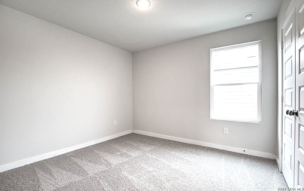 2563 Rambo Drive San Antonio, TX 78224 - Photo 16 of 21 an empty room with a window
