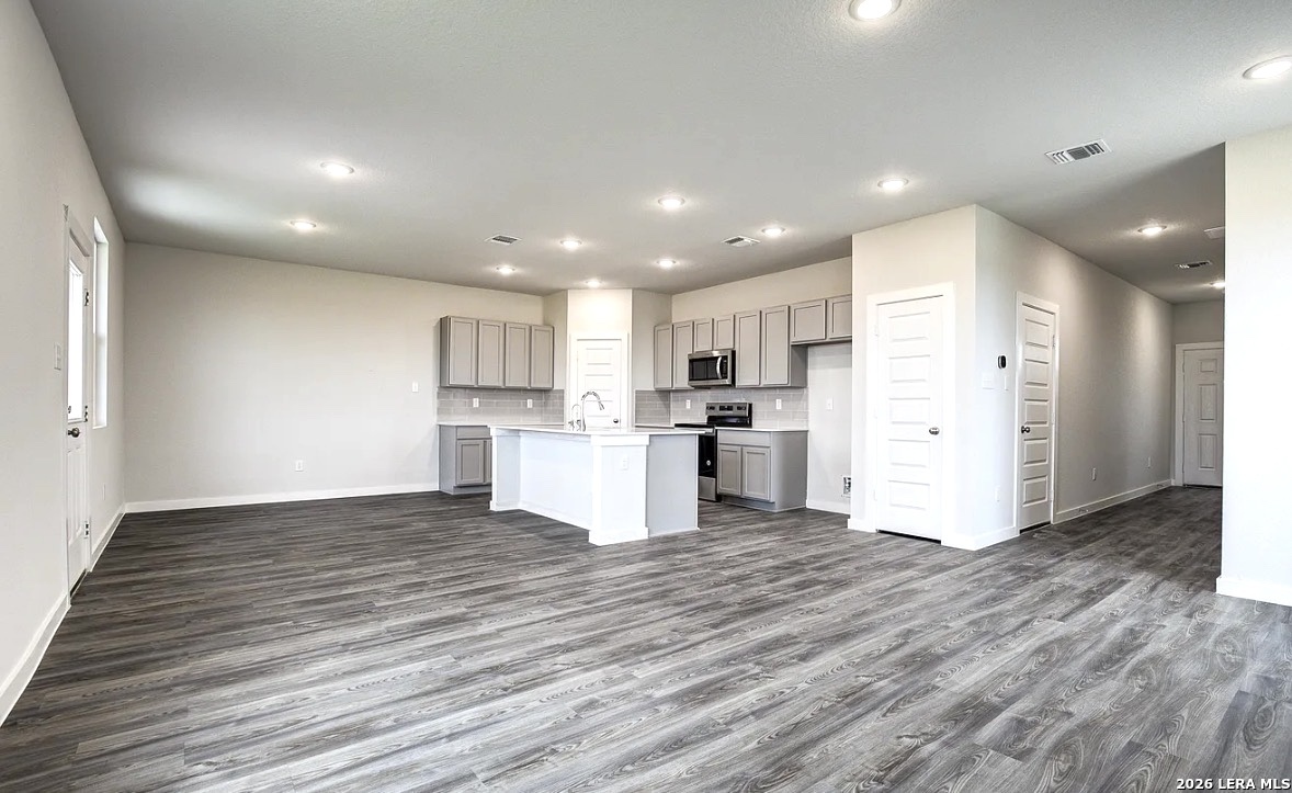 2563 Rambo Drive San Antonio, TX 78224 - Photo 2 of 21 a view of kitchen with wooden floor