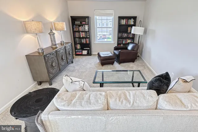 a living room with furniture and a couch