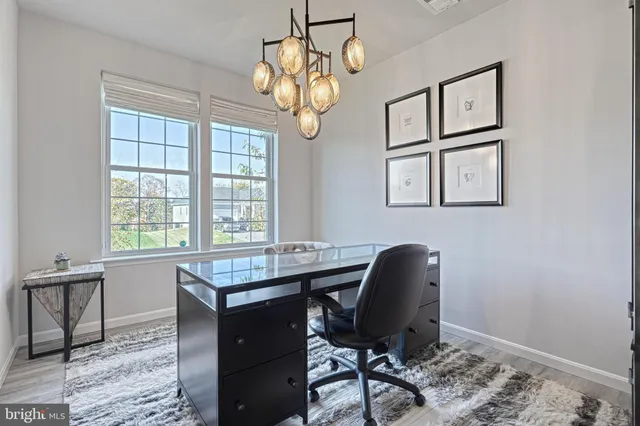 a workspace with wooden floor