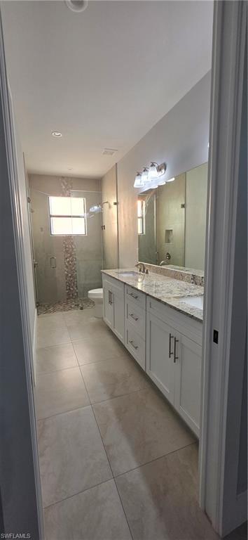 598 2nd Street Southeast Naples, FL 34117 - Photo 19 of 40 Full bathroom featuring vanity and a stall shower