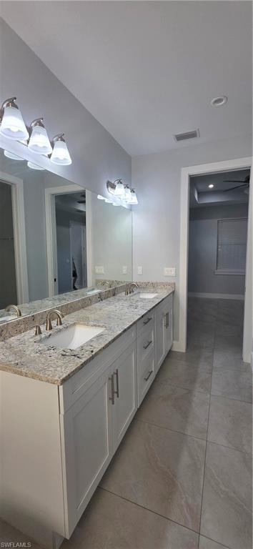 598 2nd Street Southeast Naples, FL 34117 - Photo 20 of 40 Bathroom featuring double vanity