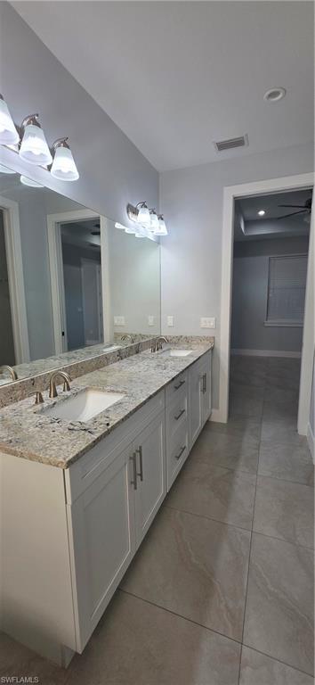 598 2nd Street Southeast Naples, FL 34117 - Photo 22 of 40 Full bath with double vanity and recessed lighting