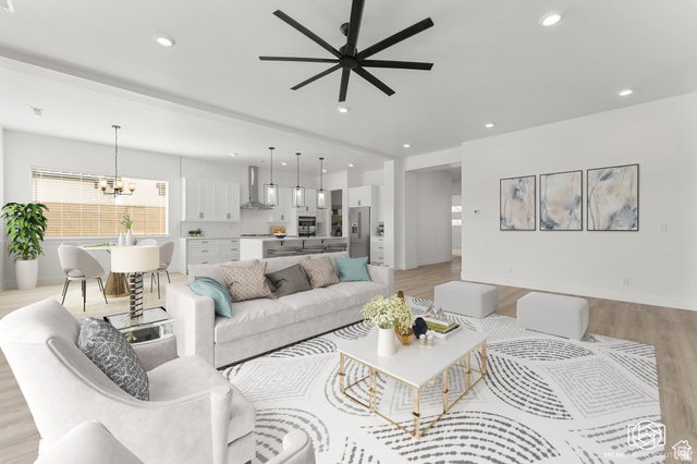 707 Spring Lily Drive St. George, UT 84790 - Photo 10 of 43 Open-concept living space featuring wood-finish flooring, recessed lighting, and a modern ceiling fan