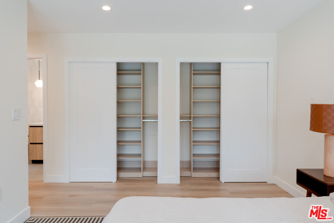 842 North Alfred Street, Unit 1 Los Angeles, CA 90069 - Photo 9 of 14 a view of room with walk in closet and bathroom