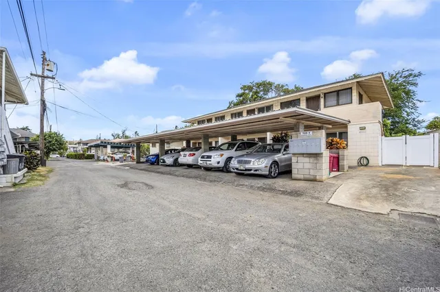 a bus parked in front of a house