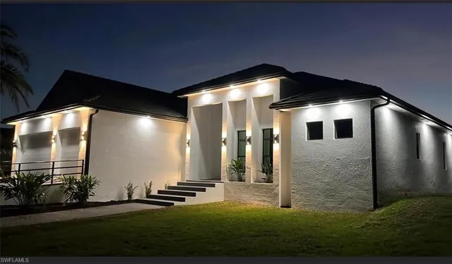 a front view of a house having yard