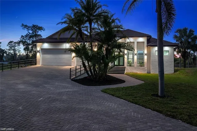 a bedroom with bed and tv