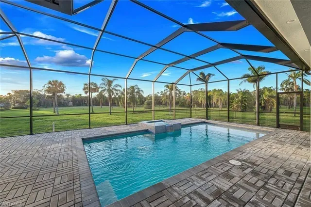 a view of a yard with palm trees