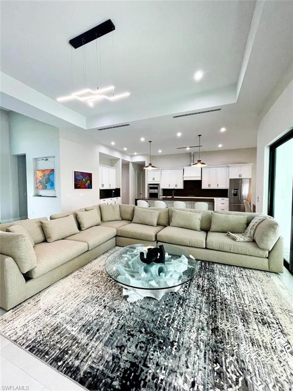 687 23rd Street Southwest Naples, FL 34117 - Photo 34 of 40 Living area with recessed lighting