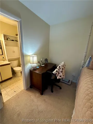 a living room with furniture window and a lamp