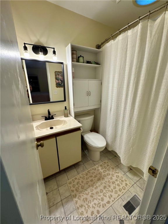 165 Springberry Lane, Unit 165 Chapel Hill, NC 27517 - Photo 25 of 41 a bathroom with a sink toilet and shower