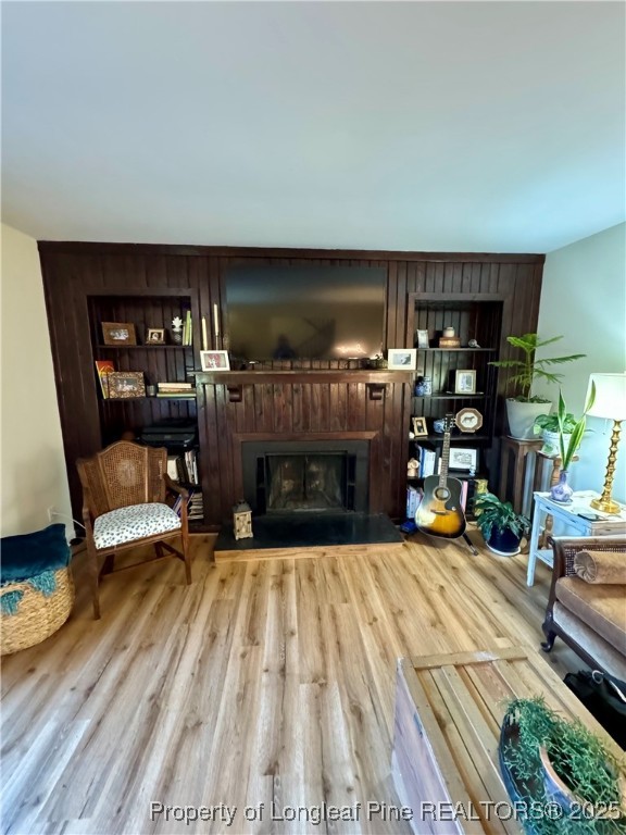 165 Springberry Lane, Unit 165 Chapel Hill, NC 27517 - Photo 3 of 41 a living room with furniture and a fireplace