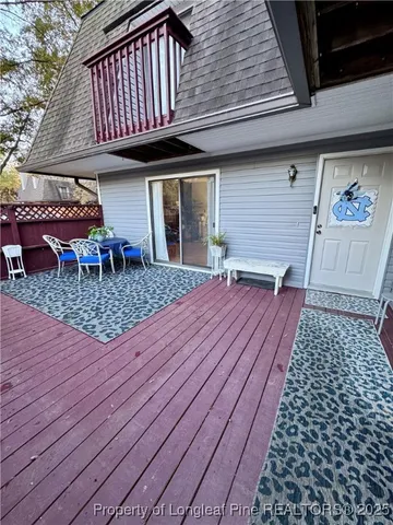 a view of a chairs with wooden deck