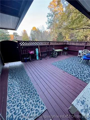 a view of a terrace with wooden floor