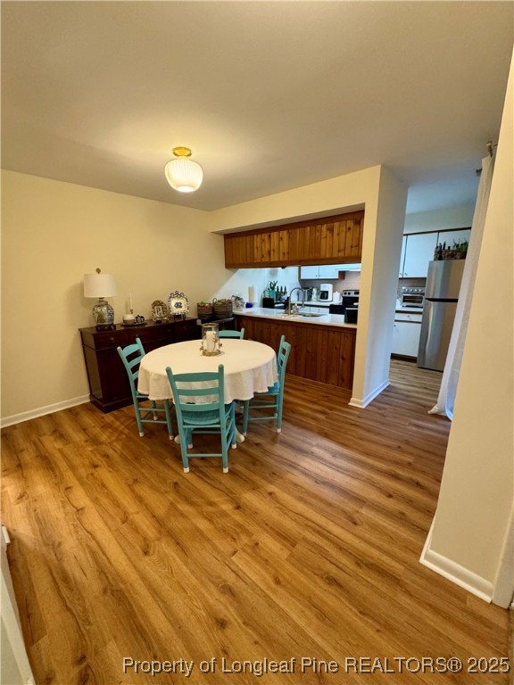 165 Springberry Lane, Unit 165 Chapel Hill, NC 27517 - Photo 4 of 41 a bed room with a bed furniture and a flat screen tv