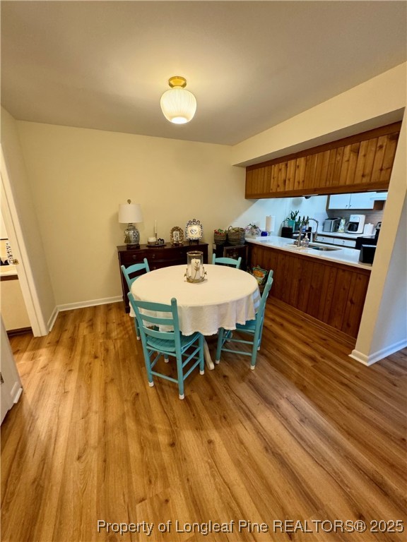 165 Springberry Lane, Unit 165 Chapel Hill, NC 27517 - Photo 5 of 41 a dining room with a table and chairs