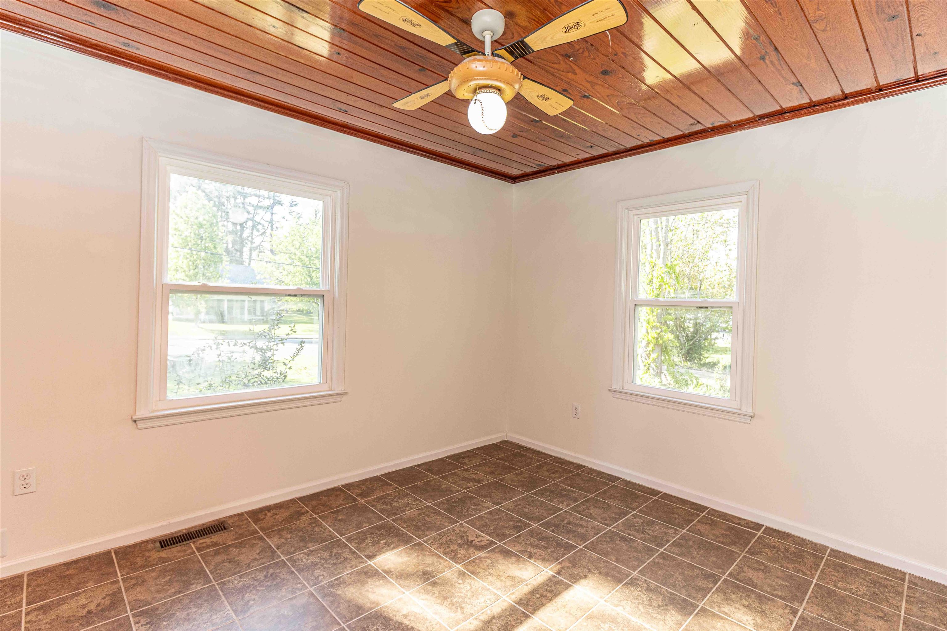 212 North Maple Street Adamsville, TN 38310 - Photo 17 of 25 an empty room with windows