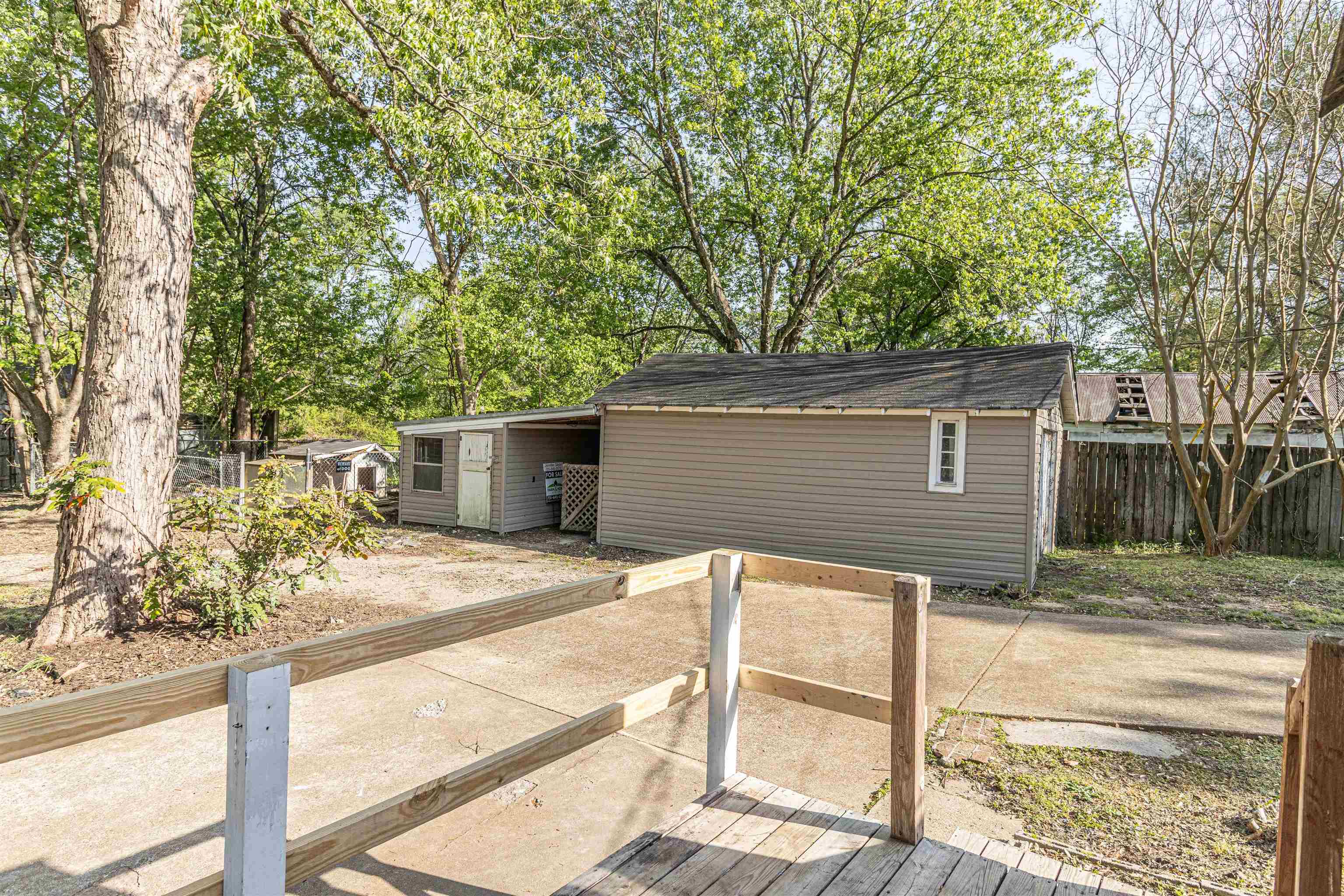 212 North Maple Street Adamsville, TN 38310 - Photo 22 of 25 front view of a house with a yard