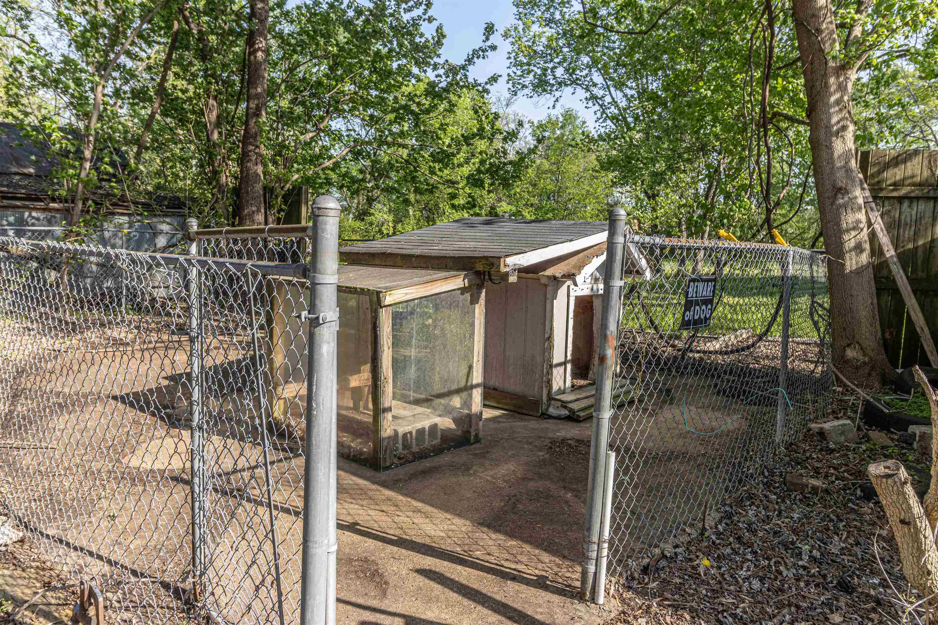 212 North Maple Street Adamsville, TN 38310 - Photo 24 of 25 a view of a patio with table and chairs and potted plants