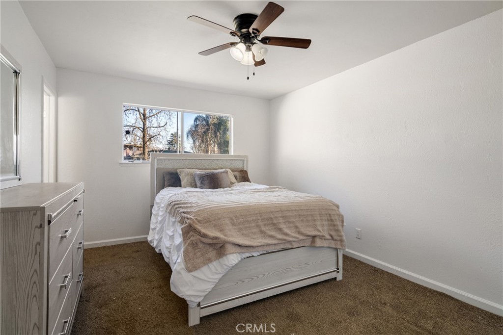 3157 Juneau Court Merced, CA 95348 - Photo 16 of 26 a bedroom with a bed and a window