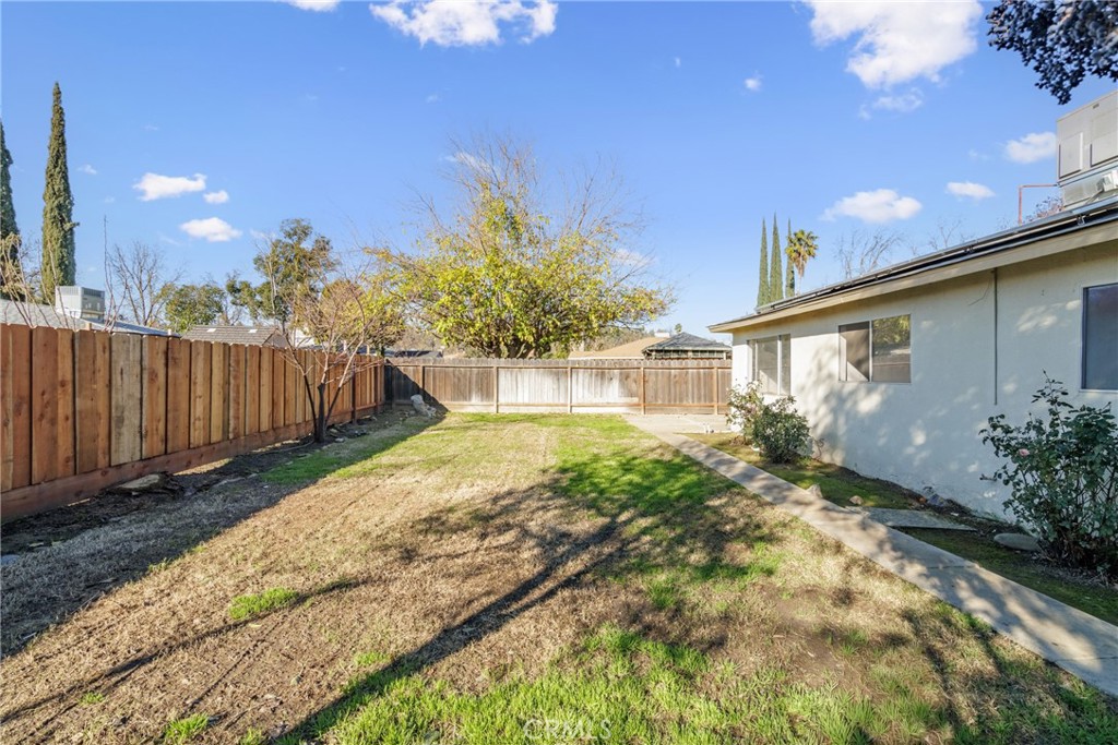 3157 Juneau Court Merced, CA 95348 - Photo 23 of 26 a front view of a house with garden