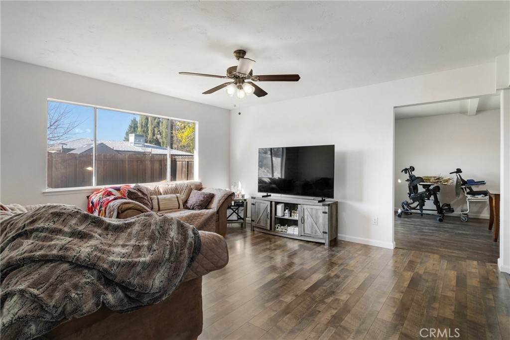3157 Juneau Court Merced, CA 95348 - Photo 6 of 26 a living room with furniture and a flat screen tv