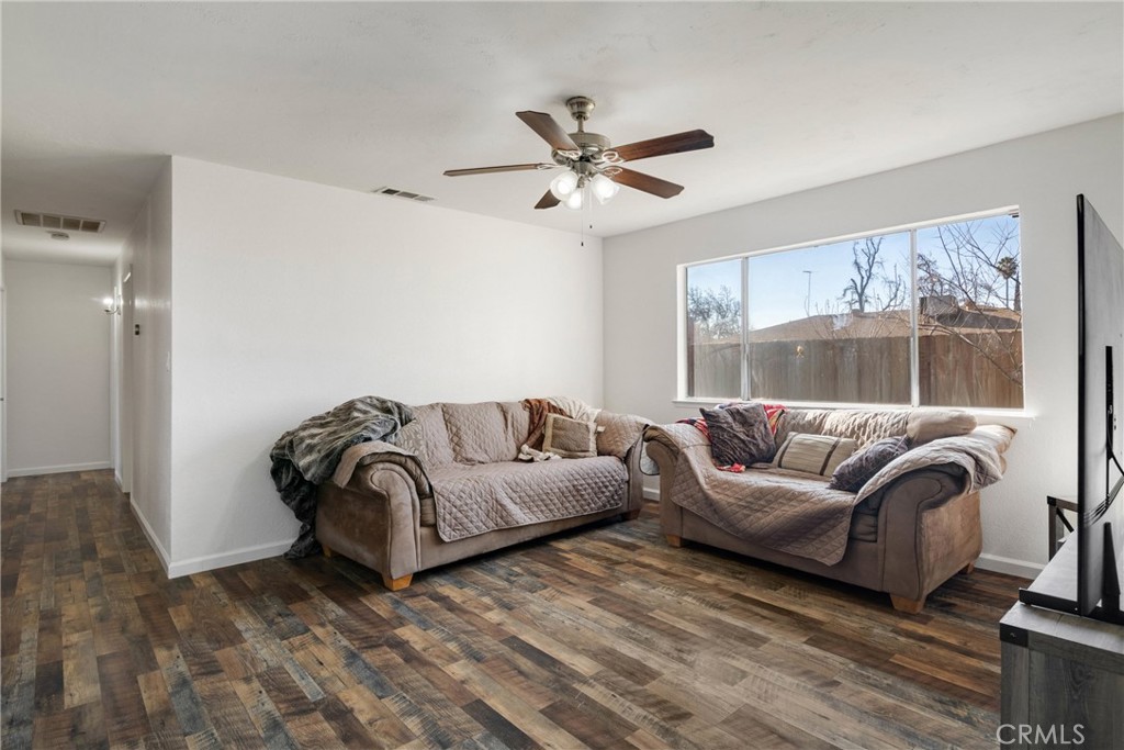 3157 Juneau Court Merced, CA 95348 - Photo 7 of 26 a living room with furniture and a large window