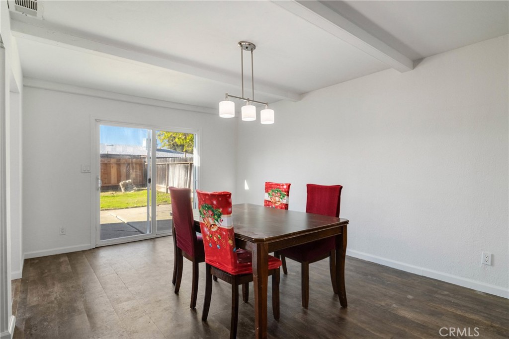 3157 Juneau Court Merced, CA 95348 - Photo 8 of 26 a dining room with furniture and window