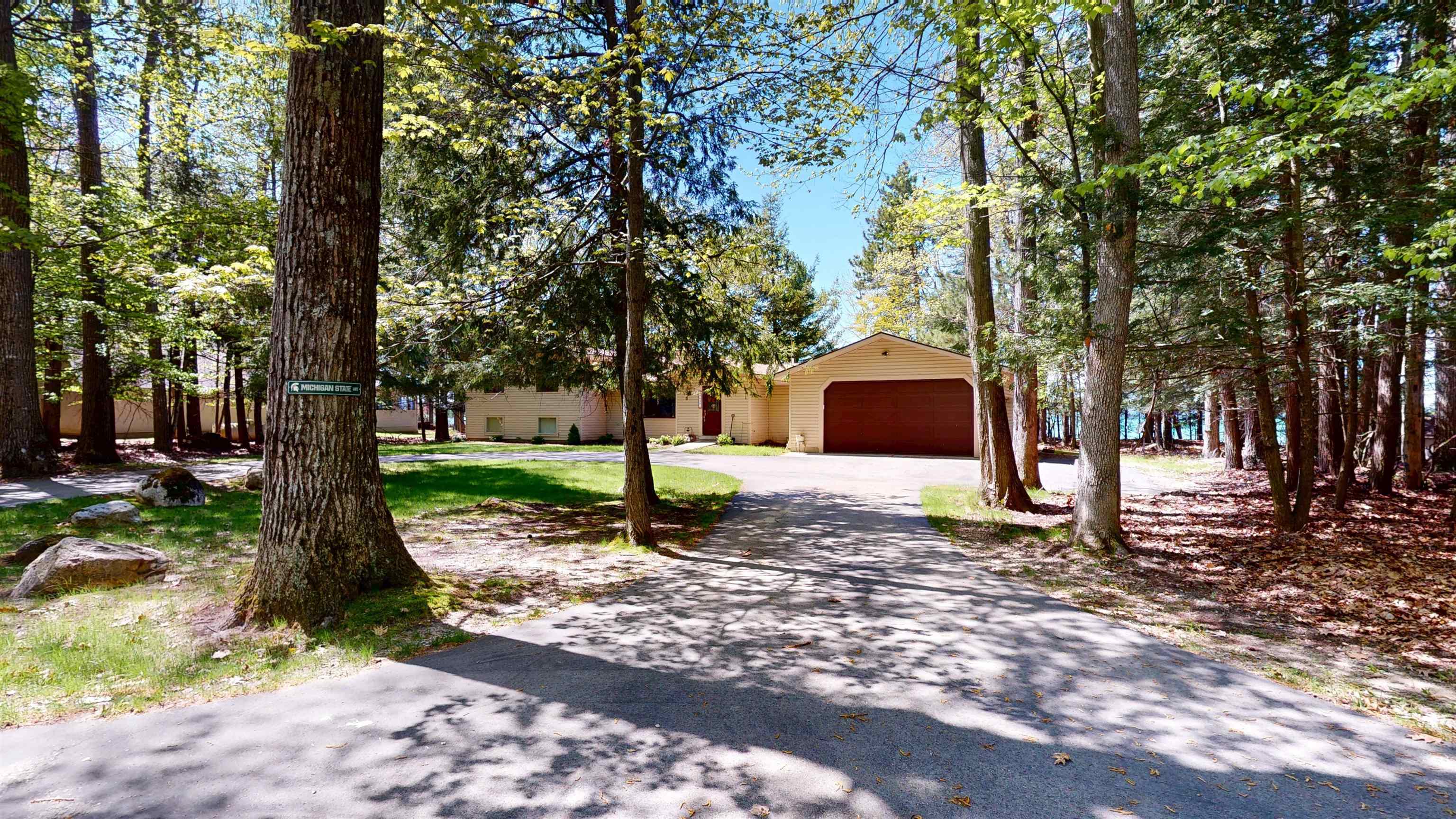 8645 Skegemog Point Road Williamsburg, MI 49690 - Photo 10 of 71