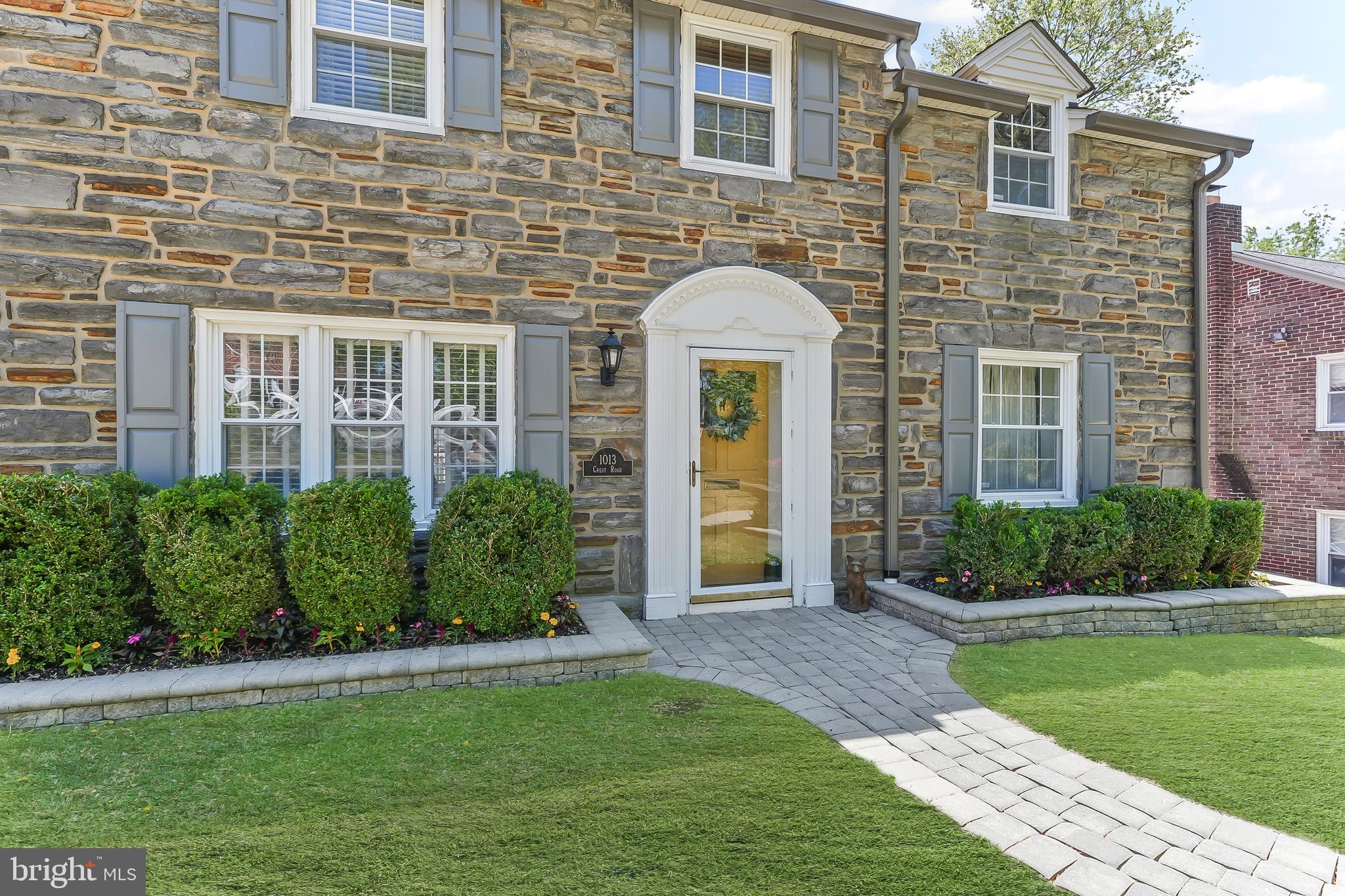 1013 Crest Road Wynnewood, PA 19096 - Photo 4 of 30 a front view of a house with garden