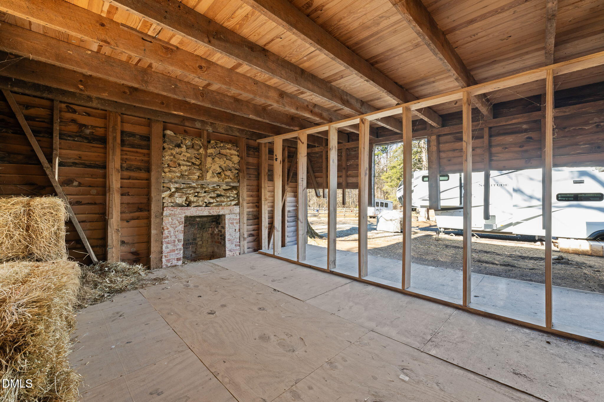 2822 Little River Church Road Hurdle Mills, NC 27541 - Photo 14 of 26 a view of an empty room with a fireplace
