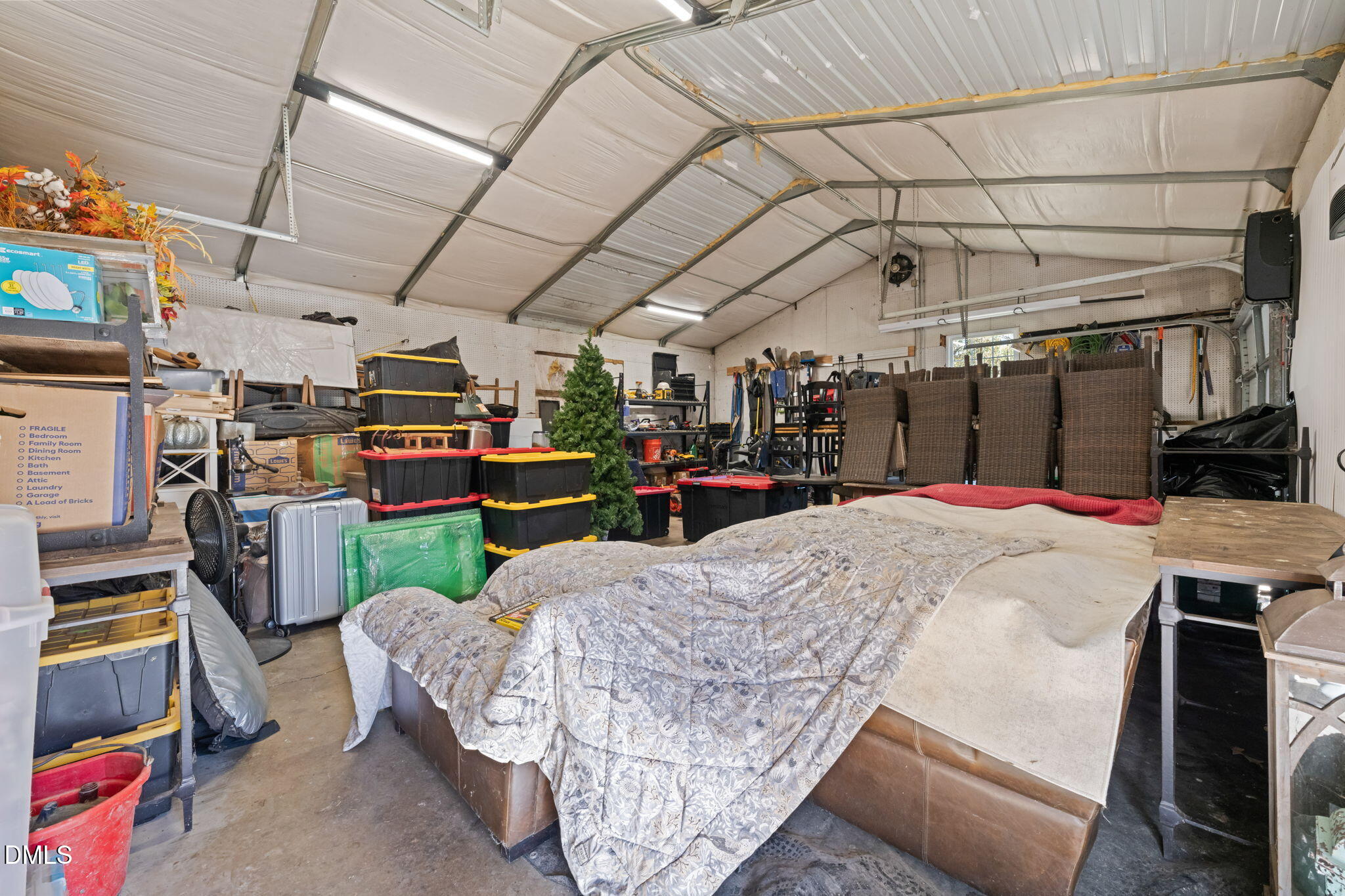 2822 Little River Church Road Hurdle Mills, NC 27541 - Photo 19 of 26 a view of a garage with furniture