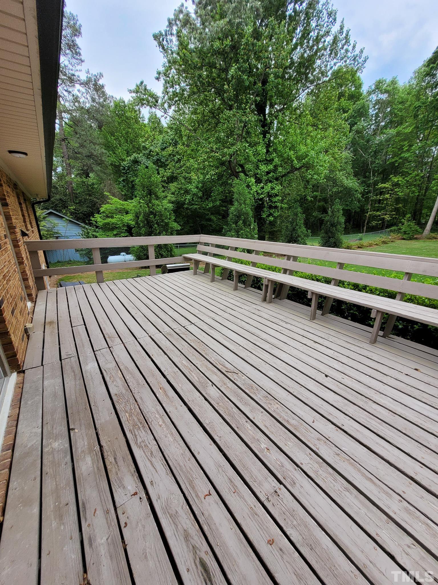6708 Johnsdale Road Raleigh, NC 27615 - Photo 42 of 44 a view of balcony with wooden floor and outdoor space