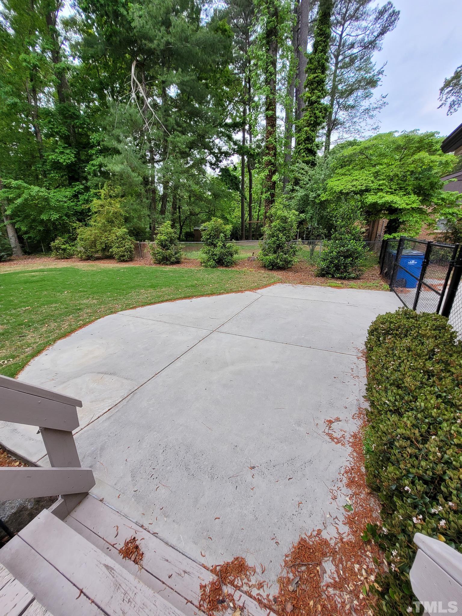 6708 Johnsdale Road Raleigh, NC 27615 - Photo 43 of 44 a view of a garden with sitting area