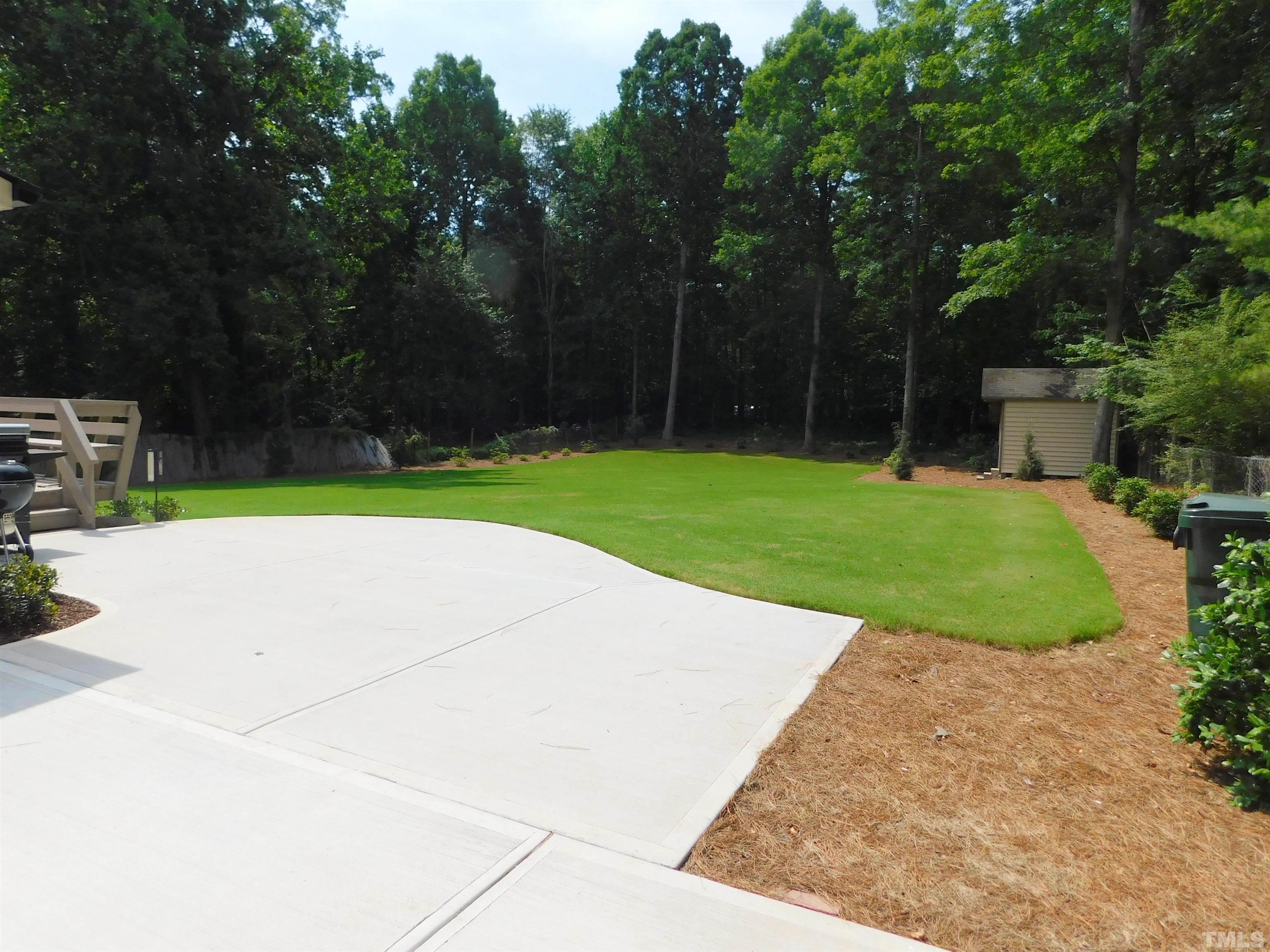 6708 Johnsdale Road Raleigh, NC 27615 - Photo 6 of 44 a view of a park with large trees