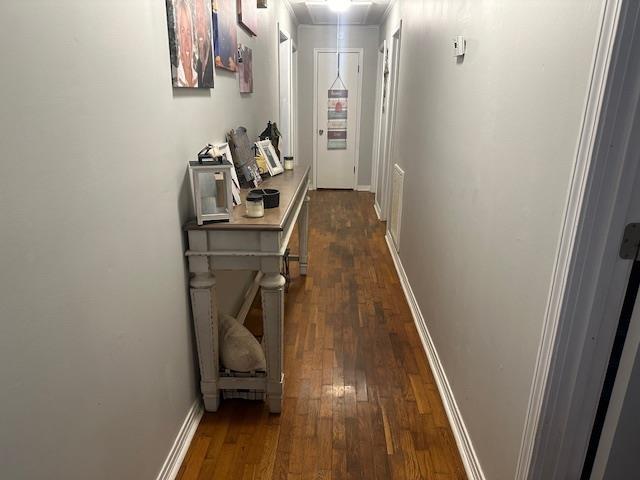 40 Lewter Road Crump, TN 38327 - Photo 11 of 25 Corridor featuring dark hardwood / wood-style floors