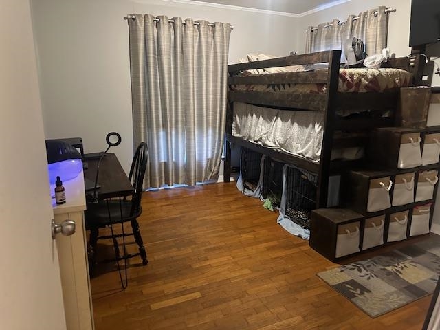 40 Lewter Road Crump, TN 38327 - Photo 12 of 25 Bedroom featuring ornamental molding and hardwood / wood-style floors