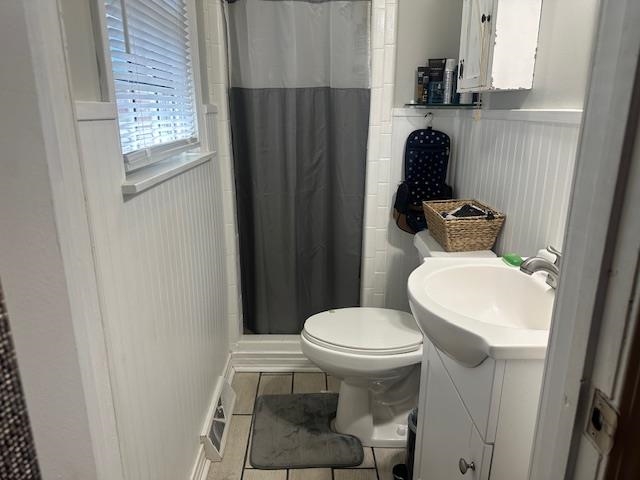 40 Lewter Road Crump, TN 38327 - Photo 16 of 25 Bathroom featuring walk in shower, vanity, toilet, and tile patterned floors