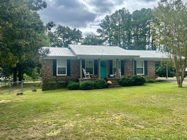 40 Lewter Road Crump, TN 38327 - Photo 19 of 25 Single story home featuring a front lawn and a porch
