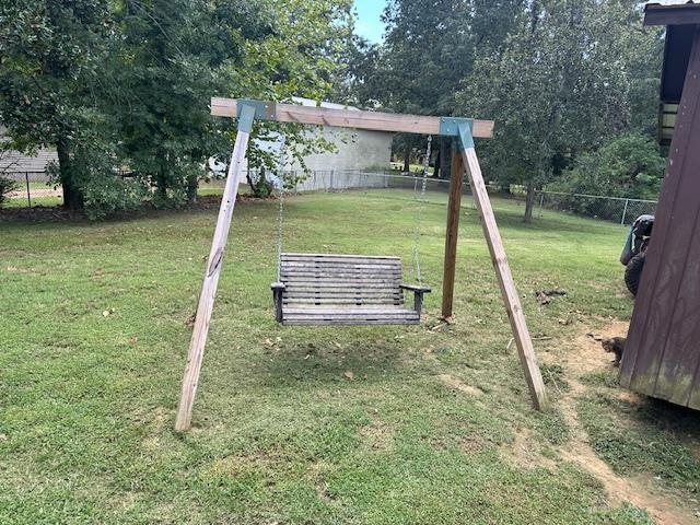 40 Lewter Road Crump, TN 38327 - Photo 23 of 25 View of jungle gym featuring a yard
